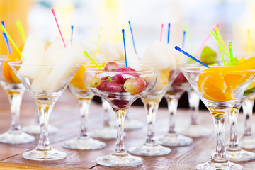 Cuts of fruits in glasses for party