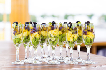 Cuts of fruits in glasses for party