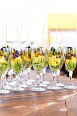 Cuts of fruits in glasses for party