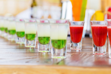 Row of shot drinks red and green