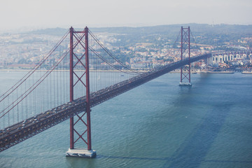 Beautiful panoramic view of 25th of April Suspension Bridge, 25 de Abril Bridge, over the Tagus river in Lisbon, Portugal