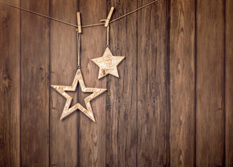 Fototapeta na wymiar Rustic Christmas Hanging Stars Background