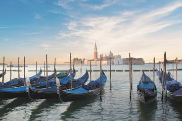 Naklejka premium Beautiful view of the gondolas and the Cathedral of San Giorgio Maggiore, on an island in the Venetian lagoon, Venice, Italy