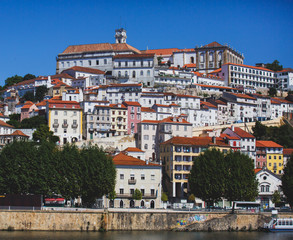 Fototapeta na wymiar View of Coimbra, city in Portugal, with University of Coimbra, summer sunny day