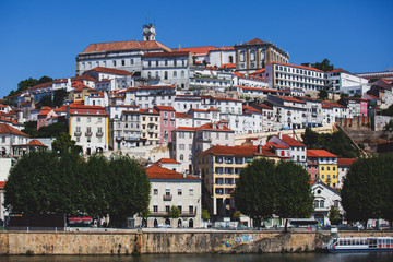 Fototapeta na wymiar View of Coimbra, city in Portugal, with University of Coimbra, summer sunny day