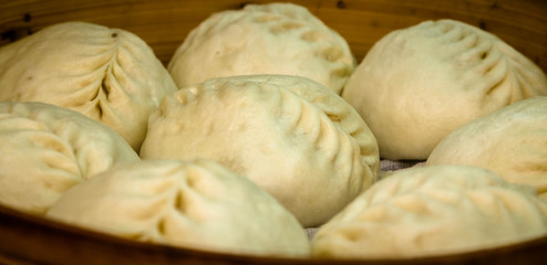 Traditional dish of Korean cuisine - dumplings in a double boiler