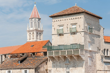  St. Mark Tower and in the background tower of the Church of St. Mikolaj. Croatia, Trogir, sightseeing a great UNESCO World Heritage town during summer days.