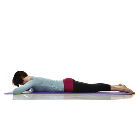 Woman exercising doing postnatal workout. Female fitness stretching hands legs abdominal exercises...
