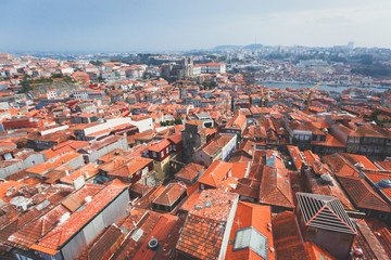 Fototapeta na wymiar Beautiful super wide-angle summer aerial view of Porto, Norte Portugal region, Portugal, with skyline and scenery beyond the old town, shot from the observation deck of Clerigos church tower