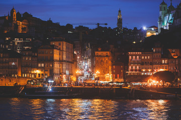 Fototapeta premium Beautiful super wide-angle panoramic summer aerial view of Old Porto Oporto city and Ribeira Square with the old town, during the sunset over Douro river from Vila Nova de Gaia, Porto, Portugal