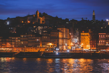 Fototapeta na wymiar Beautiful super wide-angle panoramic summer aerial view of Old Porto Oporto city and Ribeira Square with the old town, during the sunset over Douro river from Vila Nova de Gaia, Porto, Portugal