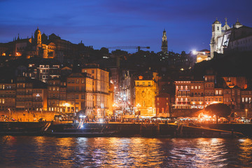 Obraz premium Beautiful super wide-angle panoramic summer aerial view of Old Porto Oporto city and Ribeira Square with the old town, during the sunset over Douro river from Vila Nova de Gaia, Porto, Portugal