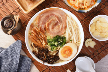 Delicious Japanese spare-rib ramen on wooden table