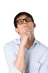 Young man with his arms folded appearing deep in thought