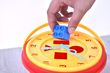 Clock brick toy