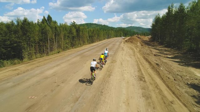 Aerial view of road cyclists. Red Bull Trans-Siberian Extreme 4k