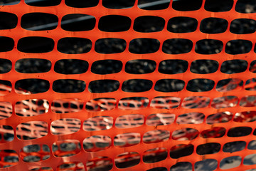 Vivid orange construction safety net