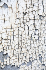 Decaying wall with cracked paint on it's surface