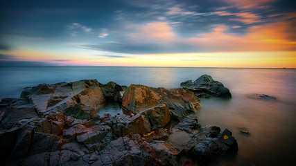 Beautiful sunset at Lake Superior with rocks