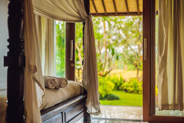 beautiful room in villa, towel on the bed © galitskaya