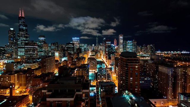 Time-lapse of the Chicago skyline at night with skycrapers