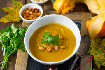 pumpkin soup on wooden surface