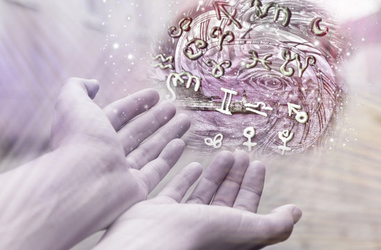 Astrology zodiac signs in hands