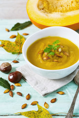 pumpkin soup on wooden surface