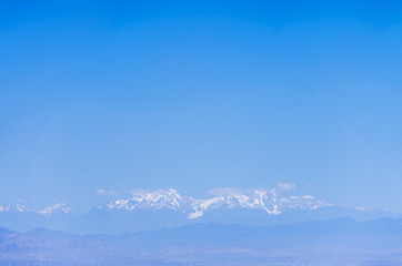 Desert and mountain over blue sky and white clouds on altiplano