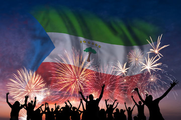 People are looking on fireworks and flag of Equatorial Guinea