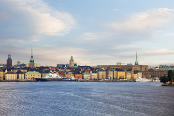 Fototapeta premium Stockholm, Sweden, sea View of the old town-Gamla Stan. It is the historic centre of Stockholm. In the picture on the left you can see the town Hall, to the right of the Church of St. Gertrude