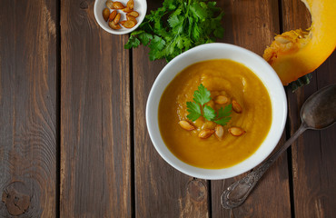 pumpkin soup on wooden surface