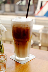 iced coffee on wooden table