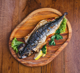 Fish dish with different ingredients on a plate