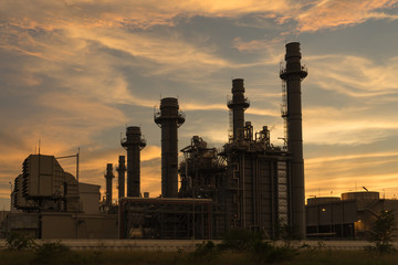 Fototapeta na wymiar Power plant in the industrial estate with twilight sunset