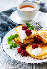Delicious pancakes with raspberries
