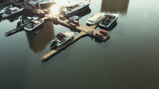 Parking for water transport, boathouse, seafront. Amazing top view of wonderful white boats and yachts.
