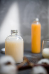 Natural spa cosmetics on a dark blue beton concrete background. Beauty blogger, minimalism concept, copy space