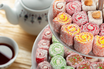 Turkish delight on a wooden table.