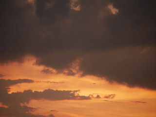 Take a photo at twilight time.The sky is mix colors orange,Blue and other colors.