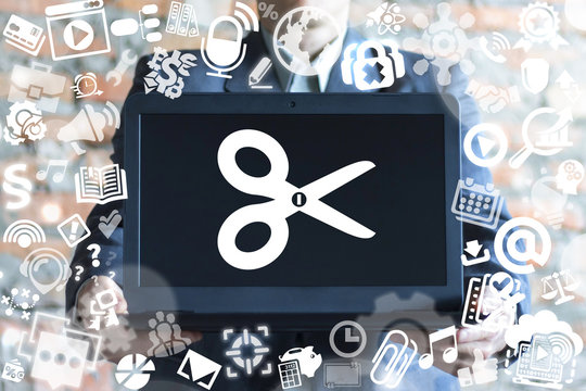 Man offers a laptop with scissors icon on a virtual doodle interface. Edit media content concept. Photo Video Music File Design Development concept.