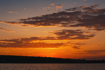 Scenic sunset on the lake. Magnificent quiet landscape