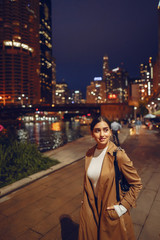 woman walking near Chicago river