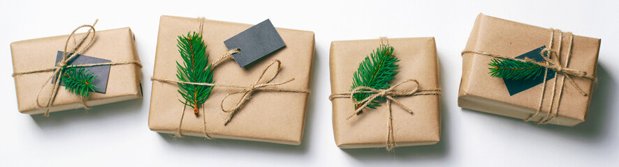 Christmas Gifts with Fir Branches on White Background