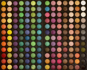 Colorful makeup set of eye shadows background
