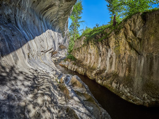River in a wild gorge. Cheile Banitei Gorge, Romania
