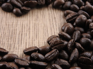 Coffee beans arranged in a frame shape.