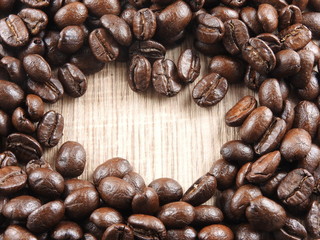 Roasted coffee beans background.It  can be made into drinks and beverages,like latte,cappuccino, espresso.Economic crop in global trade business,agricultural products exports.