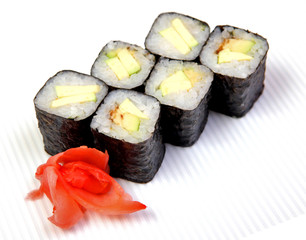Roll with cucumber. Vegetarian food. Sushi in the nori. Japanese food on a beautiful dish.
