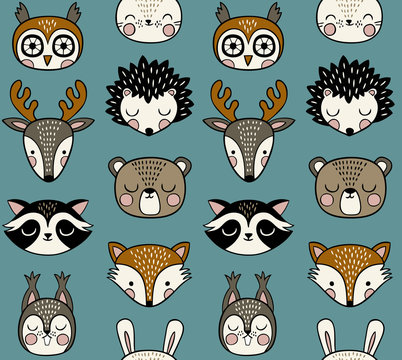 Seamless vector pattern with cute woodland animals on blue background. 